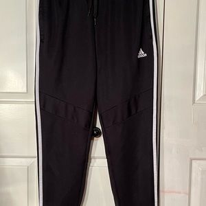 Adidas Men’s sweatpants! Only used three times! Size M with leg zippers!